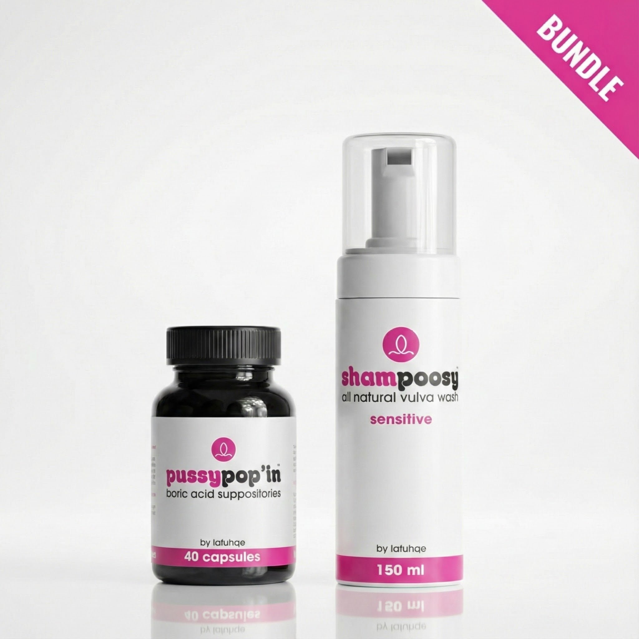 Two product bottles, one black and one white with pink labels, on a white background.